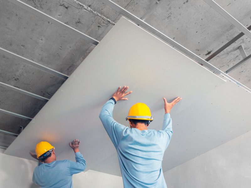 Ceiling installation with acoustic panels With professional tech